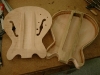 The back, top and sides are ready to be attached. The top is carved and finished with a hallowed center.